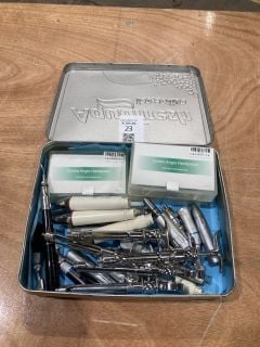 Lot 23  
            Birmingham - Collection Only 

                
ASSORTMENT OFDENTAL TOOLS INCULDING DRILL HEADS AND SYRINGES