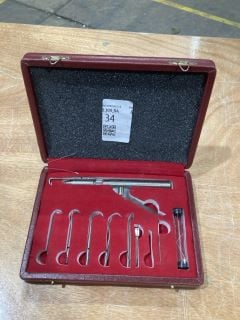 Lot 34  
            Birmingham - Collection Only 

                
BOXED MANUAL-TRIGGERED SPRING-LOADED PUNCH