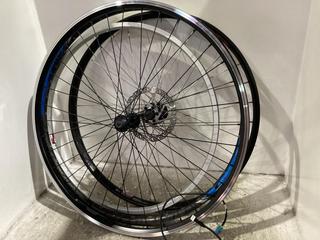 Lot 1370  
            Chesterfield SR45 - Parcel Delivery Only 

                
4 X ASSORTED BIKE WHEELS TO INCLUDE M PART WHEELS DT SWISS BIKE WHEEL (LOCATION: B5)