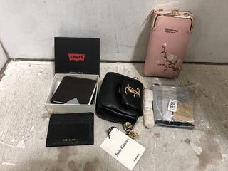 Lot 902  
            Chesterfield SR45 - Parcel Delivery Only 

                
4 X ASSORTED WALLETS/BAGS TO INCLUDE LEVI'S BROWN WALLET (LOCATION: D7)