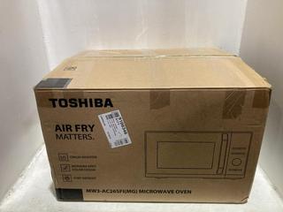 Lot 1484  
            Chesterfield SR44 - Parcel Delivery Only 

                
TOSHIBA AIR FRY MATTERS MW3-QC26SFI (MG) MICROWAVE (LOCATION: A2)