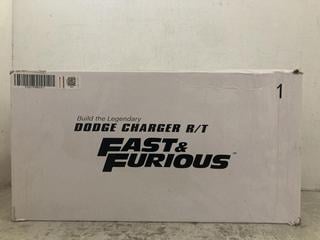 Lot 156  
            Chesterfield SR47 - Parcel Delivery Only 

                
DEAGOSTINI FANHOME FAST AND FURIOUS DODGE CHARGER BUILD UP BOX NUMBER 1 ASSEMBLY ...