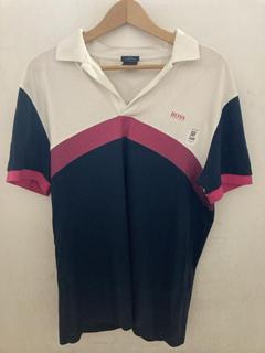 Lot 300  
            Chesterfield SR47 - Parcel Delivery Only 

                
HUGO BOSS WOMENS POLO SHIRT IN WHIYE/ PINK/ BLUE SIZE XL. (LOCATION: A11)