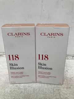 Lot 393  
            Chesterfield SR46 - Parcel Delivery Only 

                
2 X CLARINS SKIN ILLUSION HYDRATION FOUNDATION IN SHADE 118 SIENNA (LOCATION: C4)