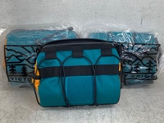 Lot 394  
            Marchington SR12 - Parcel Delivery Only 

                
3 X VICTORIA CHIMP OUT THERE BAR BAG IN TEAL/OCHRE - COMBINED RRP: £135.00: LOCAT...
