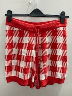 Lot 1180  
            Marchington SR11 - Parcel Delivery Only 

                
OLIVIA RUBIN WALLIS KNITTED SHORTS IN RED/WHITE - UK L - ORIGINAL RRP £120.00: LO...