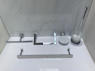 Lot 755  
            Marchington SR19 - Delivery or Collection 

                
BATHROOM ACCESSORY SET IN CHROME TO INCLUDE TOWEL RING, DUAL ROLL HOLDER, WALL MO...