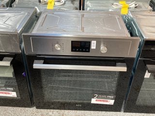 Lot 143  
            Marchington SR11 - Delivery or Collection 

                
AEG AIRFRY BUILT IN SINGLE ELECTRIC OVEN: MODEL BPX535A61M - ORIGINAL RRP £549: L...