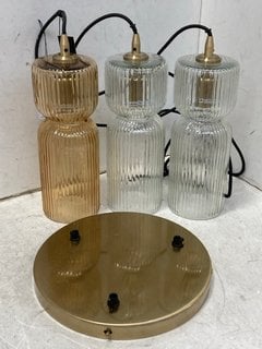 Lot 295  
            Marchington SR11 - Delivery or Collection 

                
COX & COX THREE ARIANE GLASS PENDANT CEILING LIGHT IN AMBER - ORIGINAL RRP - £295...