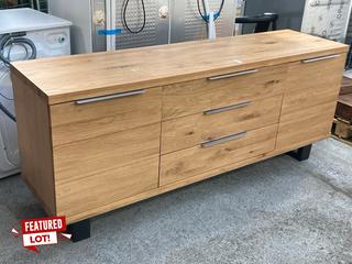 Lot 32  
            Marchington SR11 - Delivery or Collection 
                
JOHN LEWIS & PARTNERS CALIA 2 DOOR 3 DRAWER SIDEBOARD IN OAK - ORIGINAL RRP - £74...