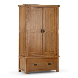 Lot 38  
            Marchington SR11 - Delivery or Collection 

                
OAK FURNITURELAND ORIGINAL RUSTIC SOLID OAK DOUBLE WARDROBE - ORIGINAL RRP - £939...