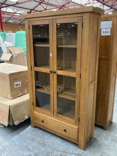 Lot 45  
            Marchington SR11 - Delivery or Collection 

                
OAK FURNITURELAND HERCULES RUSTIC SOLID OAK DISPLAY CABINET - ORIGINAL RRP £849.9...