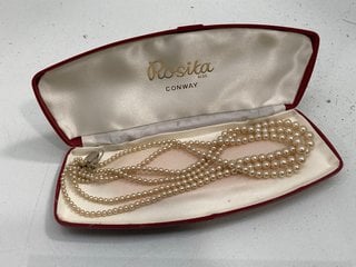 Lot 1323  
            Marchington SR13 - Parcel Delivery Only 

                
A TRIPLE STRING OF ROSITA CONWAY FAUX PEARLS IN ORIGINAL BOX: LOCATION - C4