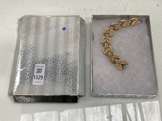 Lot 1329  
            Marchington SR13 - Parcel Delivery Only 

                
A VINTAGE 1970S ENAMELLED BRACELET, BOXED: LOCATION - C4