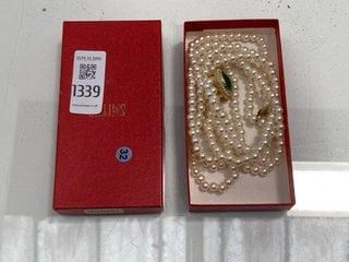 Lot 1339  
            Marchington SR13 - Parcel Delivery Only 

                
A STRING OF VINTAGE FAUX PEARLS, THE CLASP GOLD COLOURED AND SET WITH SEED PEARLS...