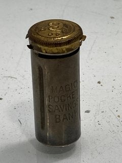 Lot 1342  
            Marchington SR13 - Parcel Delivery Only 

                
AN ANTIQUE POCKET MAGIC SAVINGS BANK CONTAINING 40 SIX PENCE COINS: LOCATION - C4