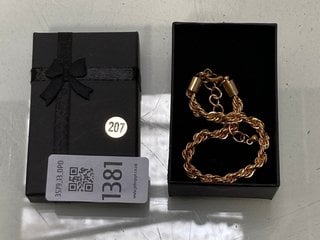 Lot 1381  
            Marchington SR13 - Parcel Delivery Only 

                
A GOLD COLOURED ROPE-TWIST BRACELET, BOXED: LOCATION - C3