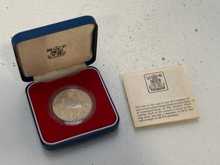 Lot 1420  
            Marchington SR13 - Parcel Delivery Only 

                
A SILVER PROOF 1977 SILVER JUBILEE CROWN FROM THE ROYAL MINT IN ORIGINAL FITTEN P...