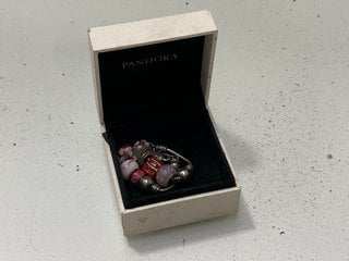 Lot 1456  
            Marchington SR13 - Parcel Delivery Only 

                
A PANDORA STYLE CHARM BRACELET, BOXED: LOCATION - C2