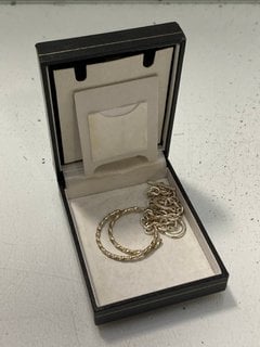 Lot 1462  
            Marchington SR13 - Parcel Delivery Only 

                
A PAIR OF SILVER COLOURED HOOP EARRINGS AND A BRACELET, BOXED: LOCATION - C2