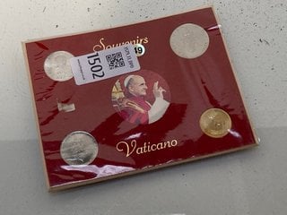 Lot 1502  
            Marchington SR13 - Parcel Delivery Only 

                
A VATICAN CITY LIRA COIN SET IN PAPAL FOLDER: LOCATION - C1