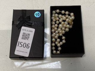 Lot 1506  
            Marchington SR13 - Parcel Delivery Only 

                
A VINTAGE STRING OF SEED PEARLS, BOXED: LOCATION - C1