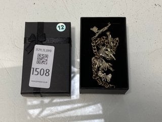 Lot 1508  
            Marchington SR13 - Parcel Delivery Only 

                
AN ANTIQUE SILVER COLOURED CHARM BRACELET, BOXED: LOCATION - C1