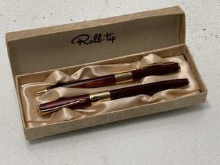 Lot 1519  
            Marchington SR13 - Parcel Delivery Only 

                
A VINTAGE 1960S PEN SET BY 'ROLL TIP', A BALLPEN AND A FOUNTAIN PEN IN ORIGINAL B...