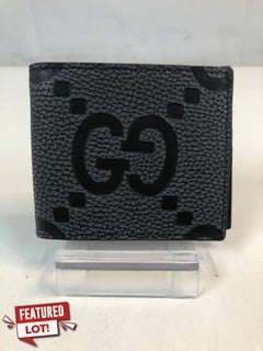 Lot 39  
            Nottingham SR1 - Delivery Only 

                
GUCCI GREY AND BLACK WALLET WITH GG MAXI LOGO ON FRONT IN HAMMERED LEATHER - ORIG...