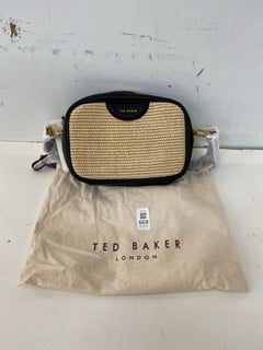 Lot 669  
            Nottingham SR2 - Delivery Only 

                
TED BAKER LONDON WEBBING FAUX RAFFIA CAMERA CROSSBODY BAG RRP : £129.00