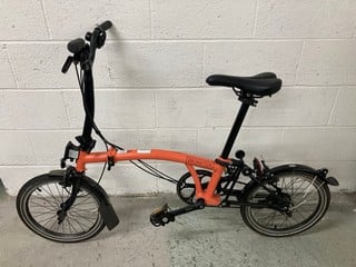 Lot 24  
            Nottingham SR4 - Collection Only 
                
BROMPTON M-6L FOLDING PEDAL BICYCLE ORIGINAL RRP £1,300 ORANGE (COLLECTION FROM S...