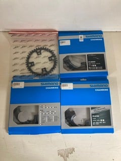 Lot 899  
            Nottingham SR5 - Delivery Only 

                
4 X BIKE ACCESSORIES TO INC SHIMANO CHAINRINGS