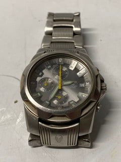 Lot 11  
            Nottingham SR6 - Parcel Delivery 
                
NIXON STAINLESS STEEL WRIST WATCH