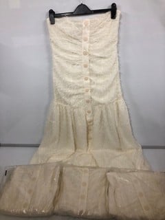 Lot 332  
            Nottingham SR6 - Parcel Delivery 
                
4 X MICHELLE KEEGAN SLEEVELESS CREAM WOMEN'S DRESSES SIZE: UK 12