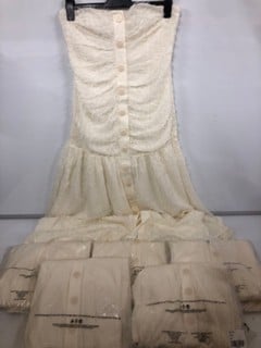 Lot 334  
            Nottingham SR6 - Parcel Delivery 
                
4 X MICHELLE KEEGAN SLEEVELESS CREAM WOMEN'S DRESSES SIZE: UK 12