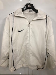Lot 388  
            Nottingham SR6 - Parcel Delivery 
                
NIKE WHITE ZIP JACKET SIZE :L