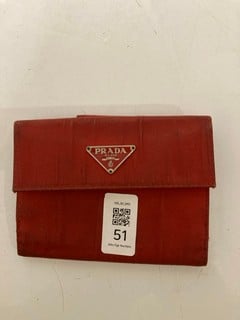 Lot 51  
            Nottingham SR6 - Parcel Delivery 
                
PRADA WALLET IN RED