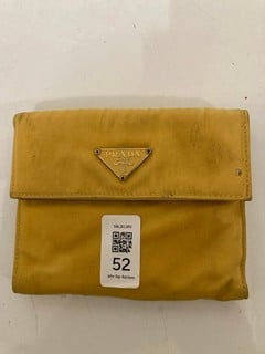 Lot 52  
            Nottingham SR6 - Parcel Delivery 
                
PRADA WALLET IN YELLOW