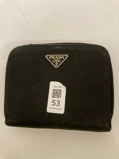 Lot 53  
            Nottingham SR6 - Parcel Delivery 
                
PRADA ZIP AROUND BLACK WALLET