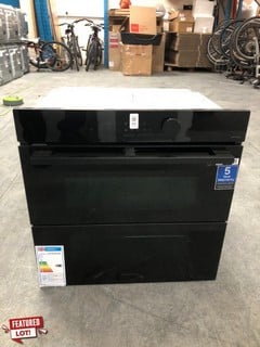 Lot 54  
            Nottingham SR6 – Delivery Or Collection 
                
SAMSUNG BUILT-IN DUAL COOK SMART OVEN MODEL: NV7B5750TAK (EX-DISPLAY) ORIGINAL RR...