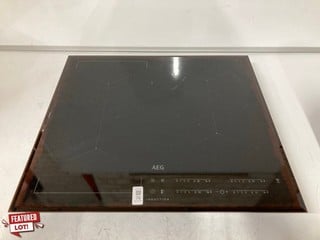 Lot 76  
            Nottingham SR6 – Delivery Or Collection 
                
AEG ELECTRIC INDUCTION HOB MODEL: IKB64301FB (EX-DISPLAY) ORIGINAL RRP: £349.99