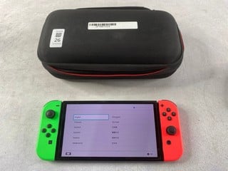 Lot 26  
            Nottingham Prem - Delivery Only 

                
NINTENDO SWITCH HANDHELD GAMING CONSOLE: MODEL NO 1540 (WITH TRAVEL CASE & ACCESS...