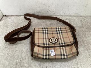 Lot 219  
            Chesterfield SR39 - Parcel Delivery Only 

                
BURBERRYS CROSS BODY BAG IN BEIGE (LOCATION: B3R)