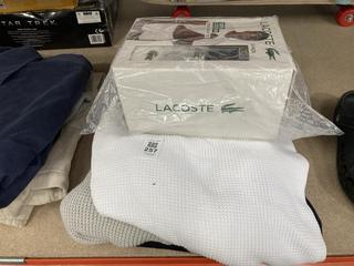 Lot 257  
            Chesterfield SR39 - Parcel Delivery Only 

                
5 X ASSORTED CLOTHING TO INCLUDE LACOSTE SOCKS 3 PACK (LOCATION: B3R)
