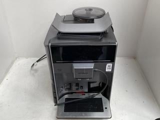 Lot 348  
            Chesterfield SR39 - Parcel Delivery Only 

                
SIEMENS EQ6 PLUS S100 COFFEE MACHINE IN BLACK ORIGINAL RRP- £1000 (LOCATION: B5R)