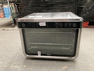 Lot 34  
            Chesterfield SR39 - Parcel Delivery Only 

                
NINJA CONVECTION OVEN IN STAINLESS STEEL MODEL: DT200UK ORIGINAL RRP- £269.99 (LO...