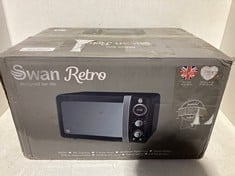 Lot 191  
            BIRMINGHAM SR111 - PARCEL DELIVERY ONLY 

                
SWAN RETRO 800W BLACK MICROWAVE.