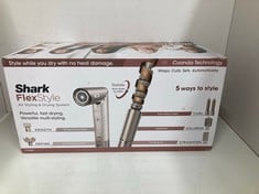 Lot 471  
            Edinburgh SR34 - Delivery Only 

                
SHARK FLEXSTYLE 5-IN-1 AIR STYLER & HAIR DRYER WITH AUTO-WRAP CURLERS, PADDLE BRU...