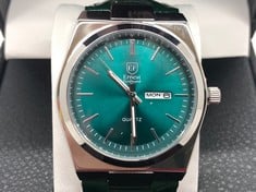 Lot 6  
            Edinburgh SR34 - Delivery Only 

                
MENS ERNEST FERDINAND WATCH - DAY DATE CALENDAR DIAL - LEATHER STRAP - 3ATM WATER...