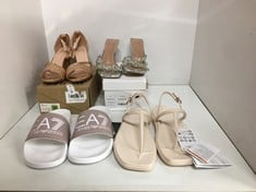 Lot 258  
            Edinburgh SR24 - Delivery Only 

                
QUANTITY OF FEMALE SHOES TO INCLUDE ARMANI WHITE SANDALS SIZE 6:: LOCATION - RACK E